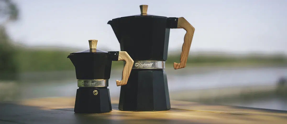 Outwell Brew Espresso Maker XL in kitchenware, showing the compact espresso machine with its sleek design and brewing spout.