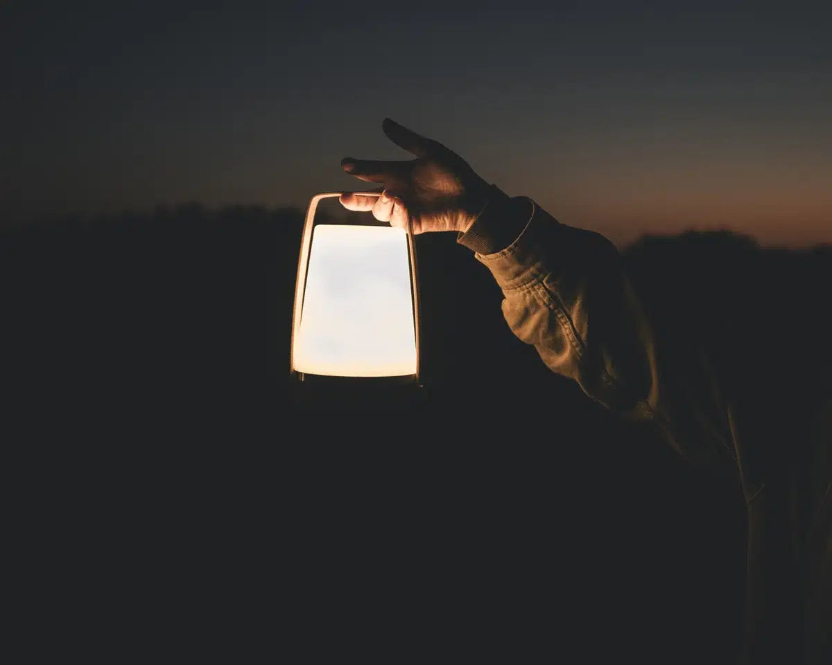 Outwell Aurelia L outdoor lighting fixture with modern design and warm LED illumination, suitable for camping and outdoor use.