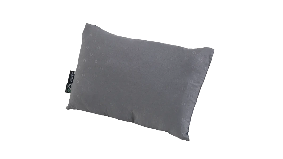 Outwell Comfort Pillow shown in a cozy setting, featuring soft fabric and supportive design for comfortable rest.