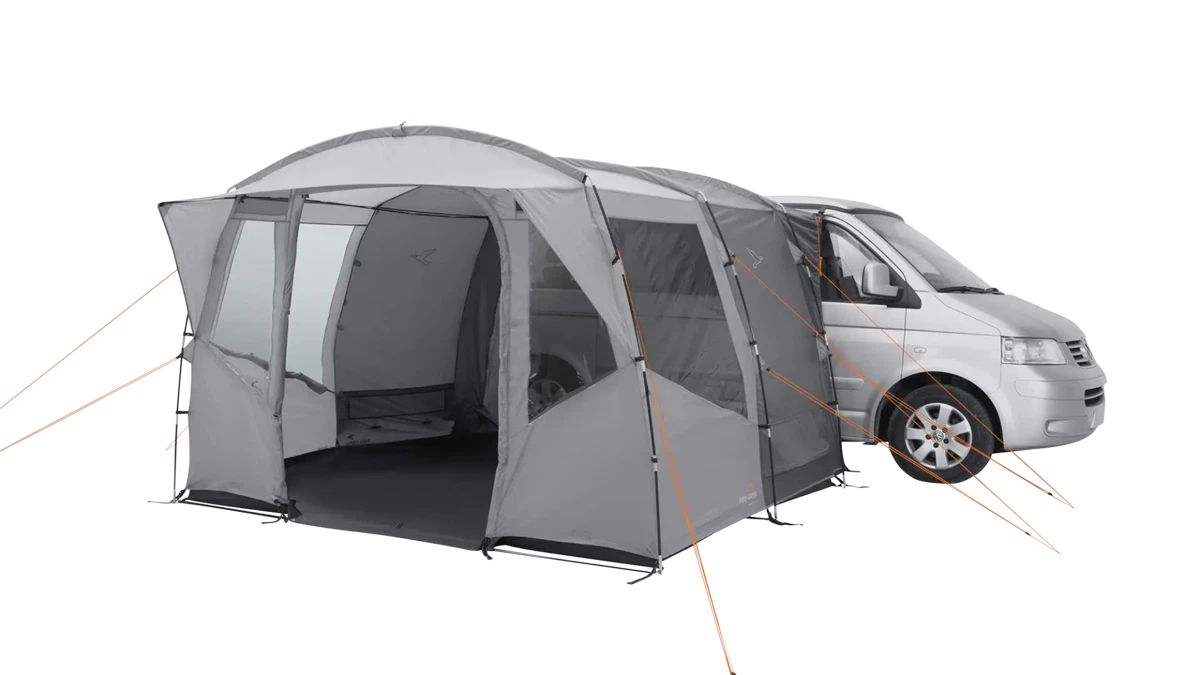Easy Camp Reine drive-away van awning set up outdoors, showcasing its fabric and structure for camping or RV use.