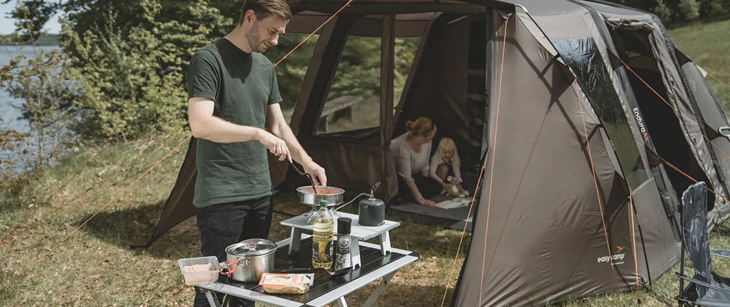 Easy Camp Moss Tour Cook Set kitchenware with pots and utensils for outdoor cooking, featuring durable, compact design.