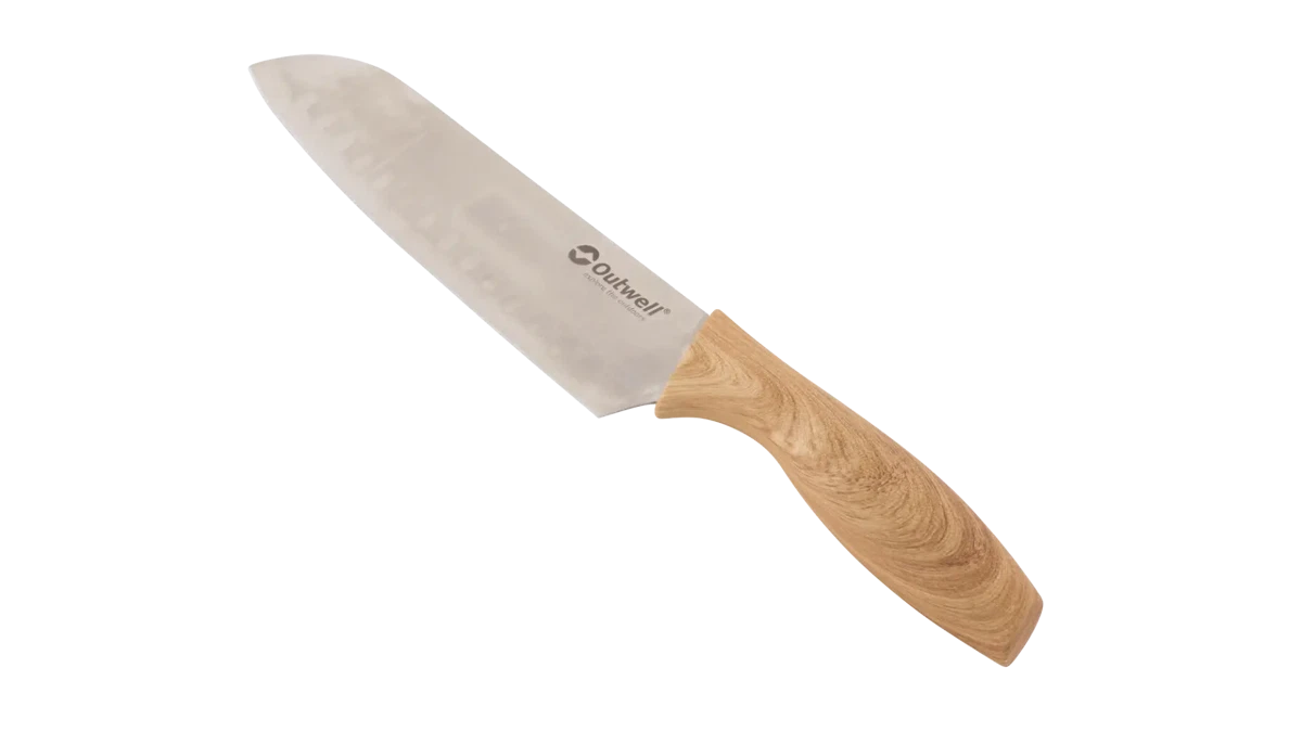 Outwell Caldas knife set with multiple kitchen knives and a wooden cutting board for food prep and cooking.