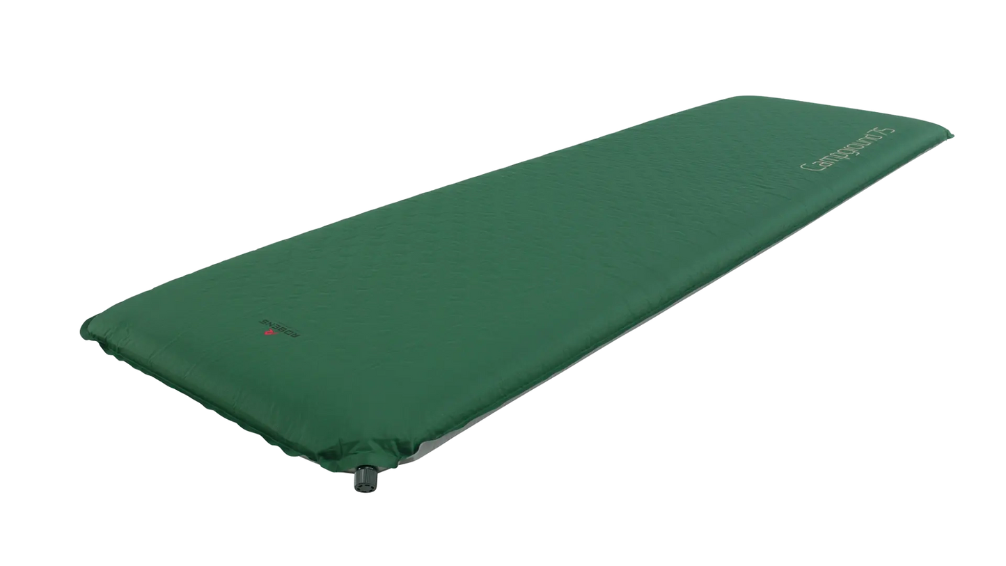 Robens Campground 75 self-inflating mat laid out on a campsite, showcasing its foam padding and compact design for outdoor sleeping comfort.