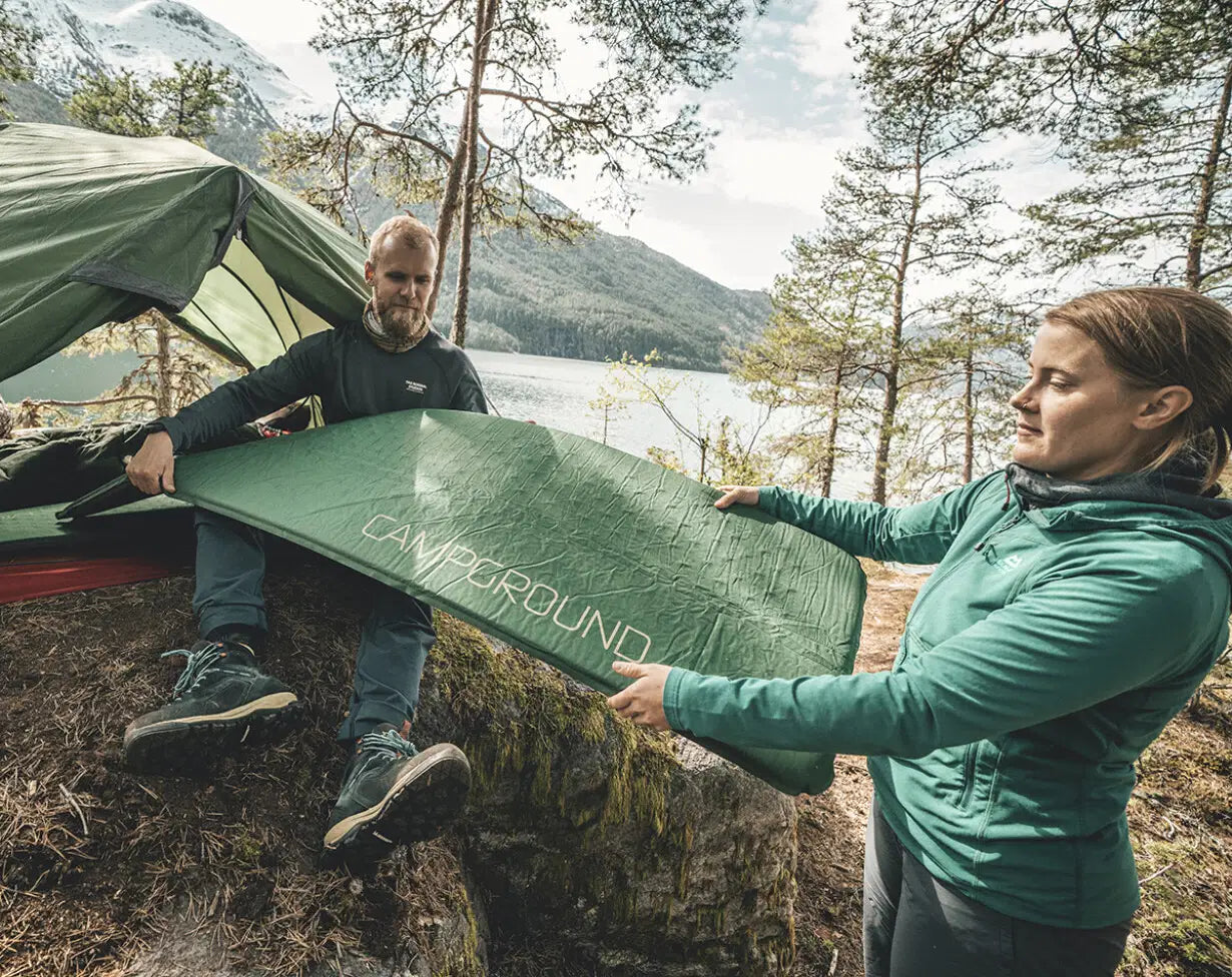 Robens Campground 75 self-inflating mat for camping, showing the cushioned surface and compact design suitable for outdoor sleep gear.