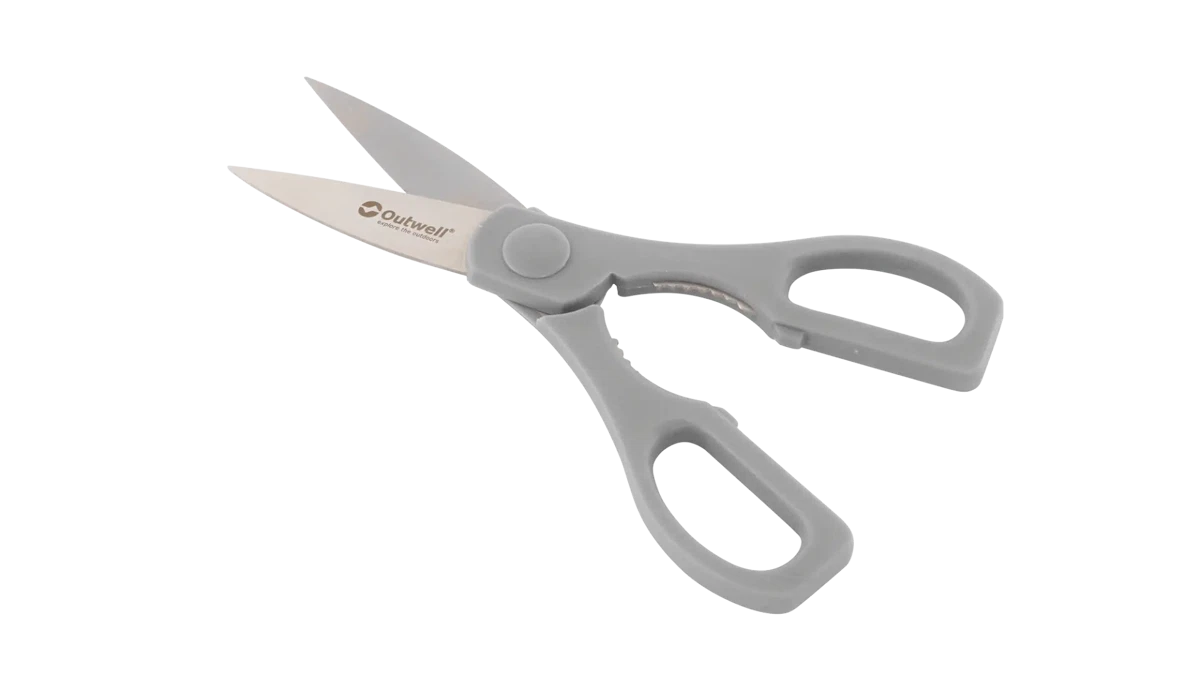 Outwell Chena knife set with peeler and scissors, kitchenware including stainless steel knives, peeler, and scissors arranged on a wooden surface.