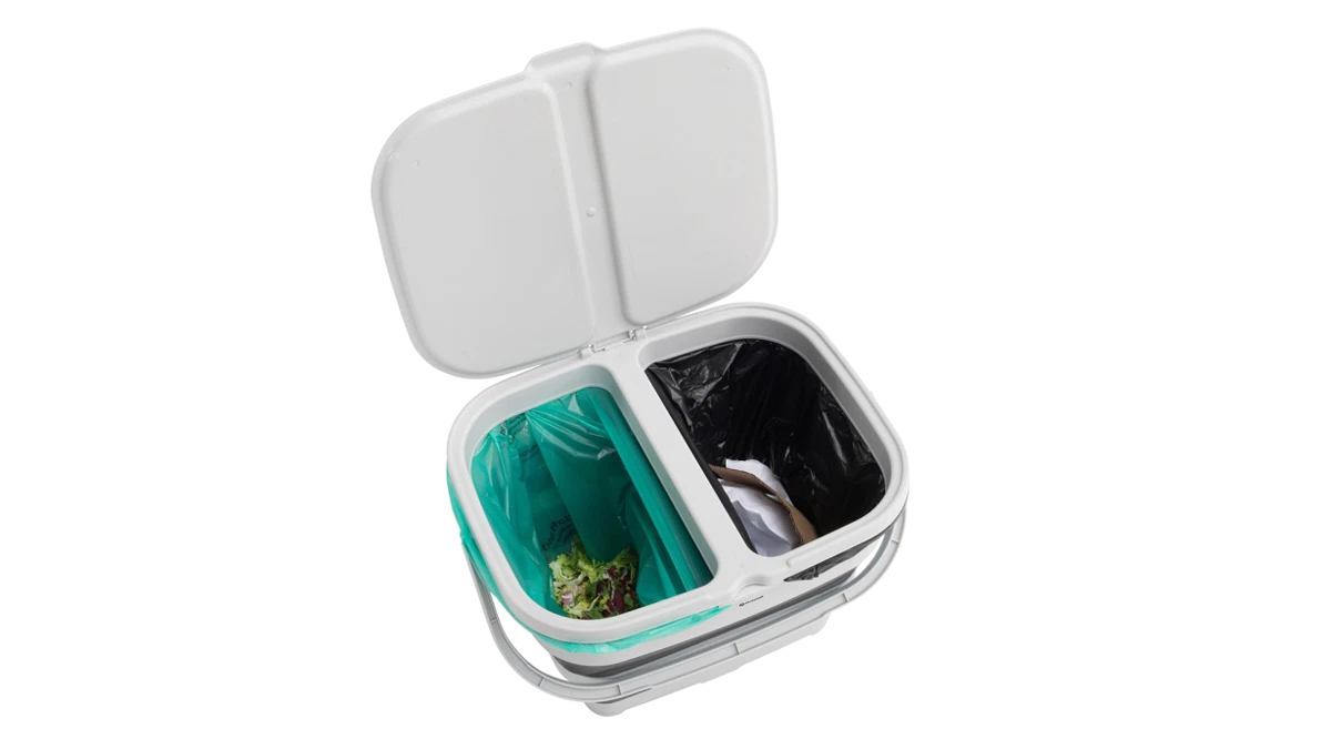 Outwell Collaps RecycleIt Basket in Grey Mist, a collapsible recycling bin with a sleek design for eco-friendly waste sorting.