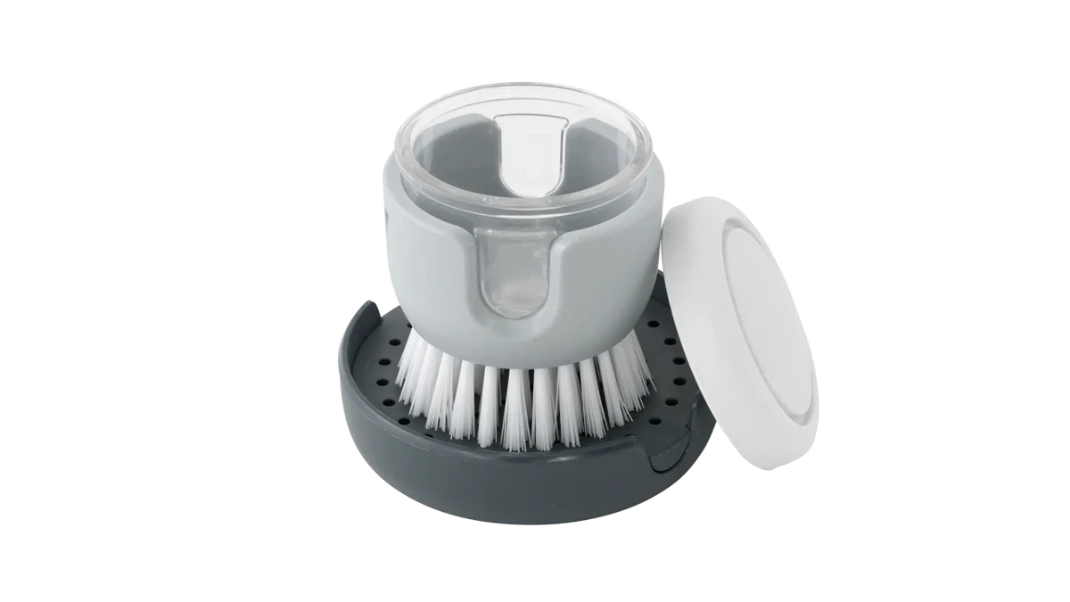 Outwell Kitson Kitchen Brush with soap dispenser, durable kitchenware for cleaning and dishwashing, in a modern design.
