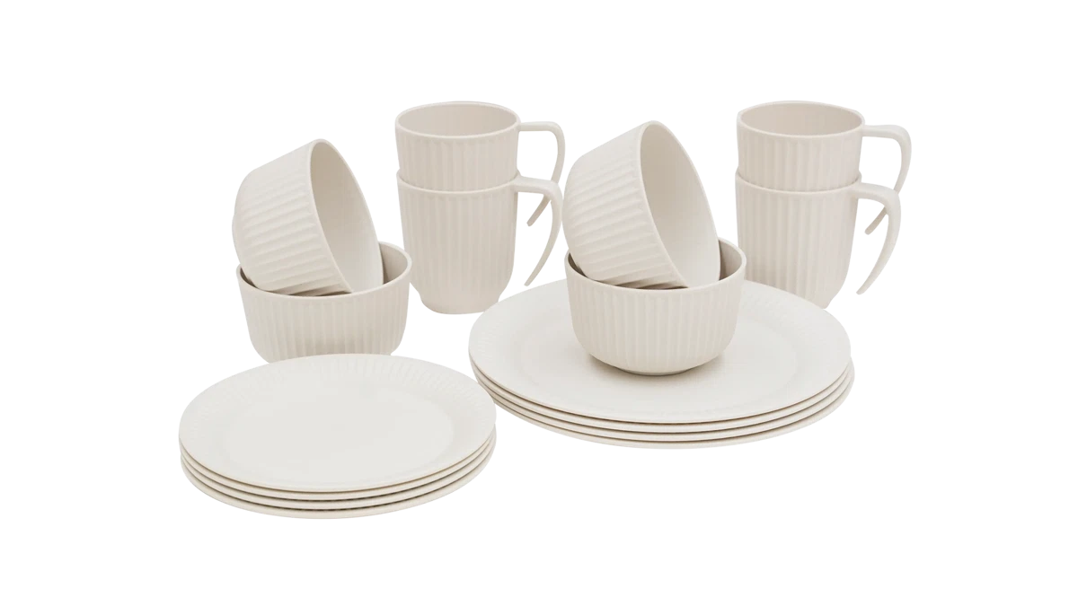 Outwell Delish 4-person dinner set in sandstone with plates and bowls, perfect for outdoor dining and camping.