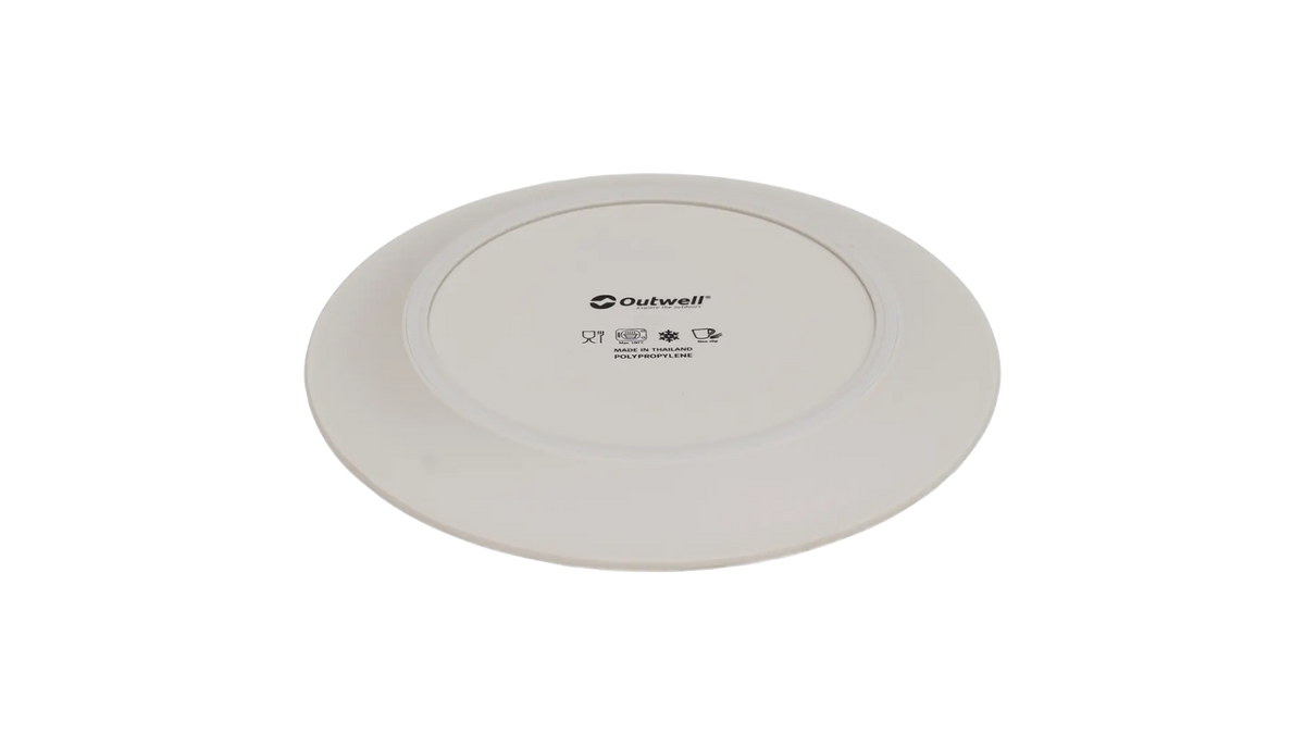 Outwell Delish 4-Person Dinner Set in sandstone with plates, bowls, and cups arranged on a table, ideal for outdoor dining.