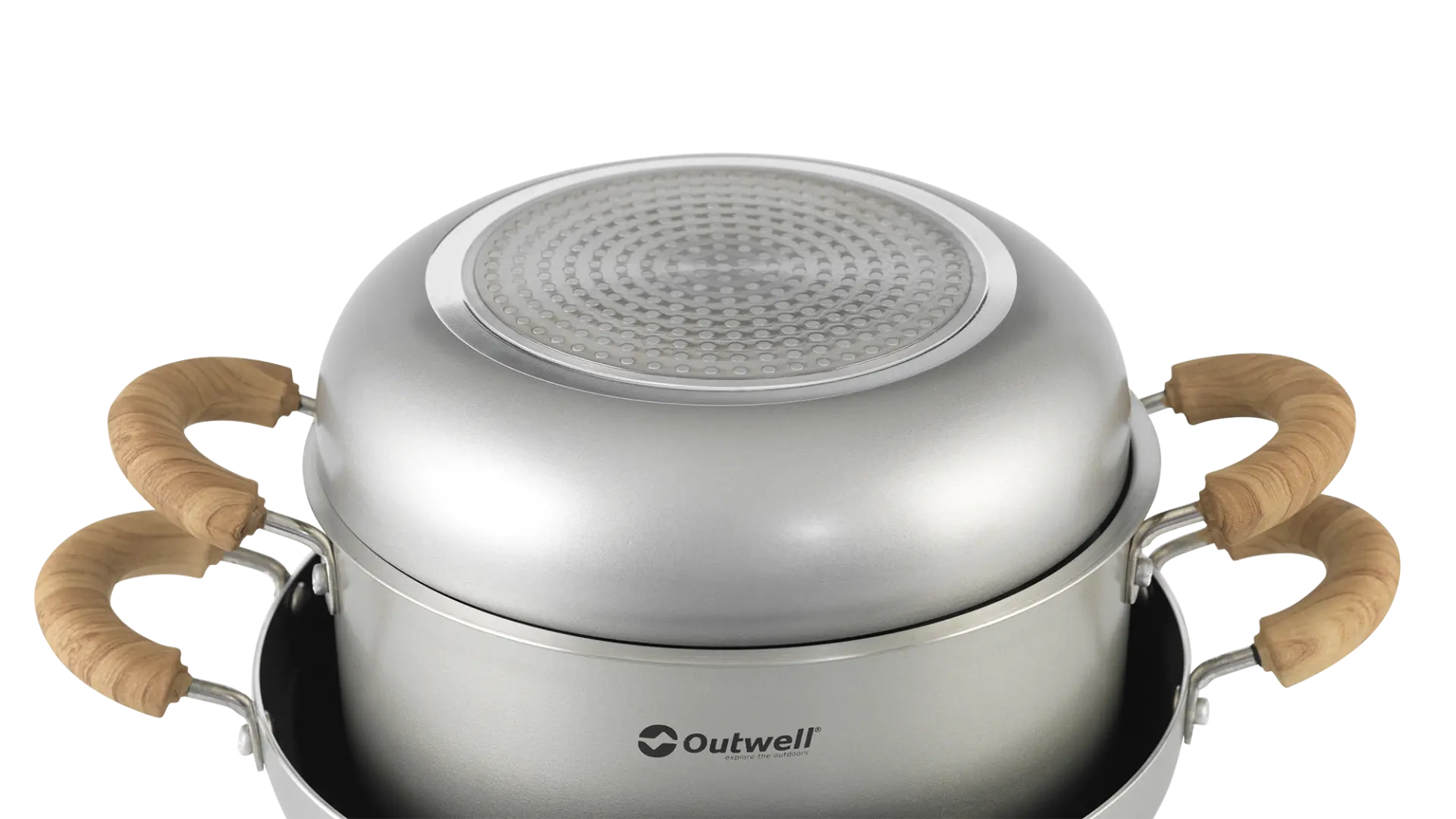 Outwell Feast Ceramic Set XL kitchenware including plates, bowls, and mugs arranged on a wooden table.