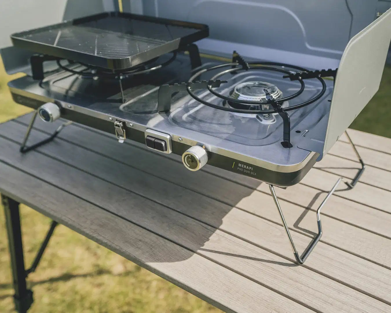 Outwell Merapi Pro Duo Deluxe burner and stove for outdoor cooking, featuring dual burners and compact design.