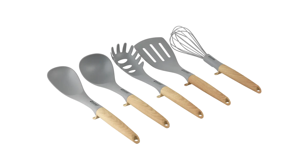 Outwell Adana Utensil Set for kitchen, includes various cooking tools with wooden handles and stainless steel heads.